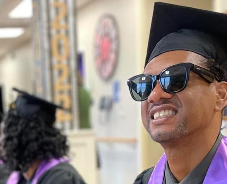 SRVS participant in a graduation cap and gown